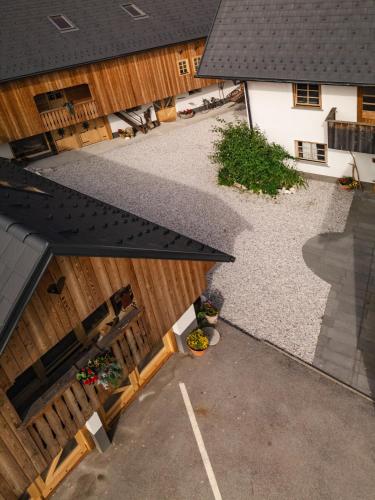 an overhead view of a building with a wooden fence at Country House Trata in Kranjska Gora