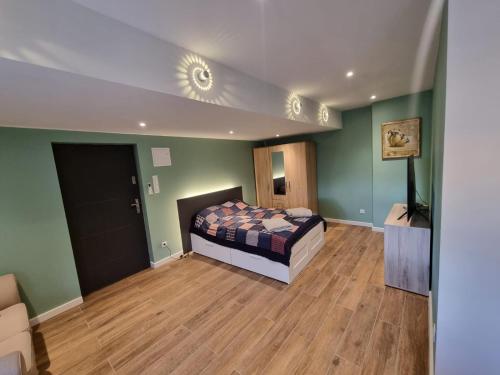 Ένα ή περισσότερα κρεβάτια σε δωμάτιο στο Apartament Megi