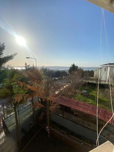 a view of the beach from the roof of a building at Private villa suitable for families with stunning sea views in Buyukcekmece