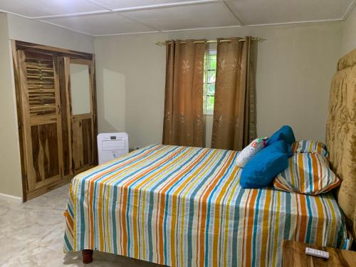 Giường trong phòng chung tại Everbless