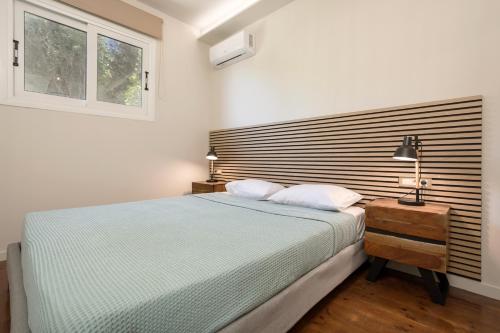 Ένα ή περισσότερα κρεβάτια σε δωμάτιο στο Azzure Vista Villa