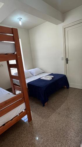 Postel nebo postele na pokoji v ubytování Nuhh Hostel