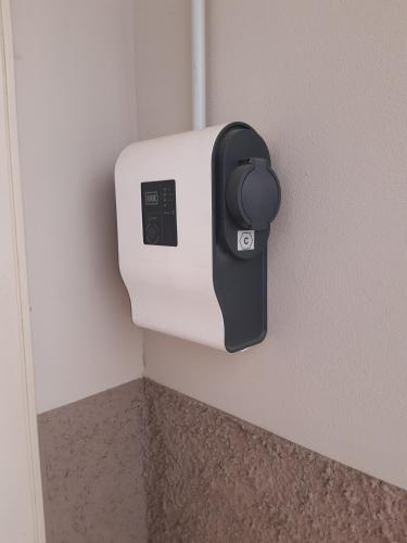a paper towel dispenser on the corner of a wall at Pane e Cioccolata in Foligno