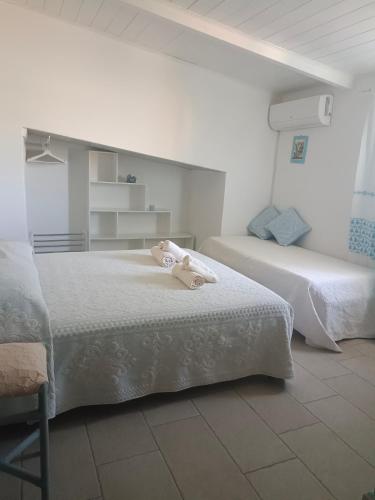 Ένα ή περισσότερα κρεβάτια σε δωμάτιο στο CASA ZENOBIO