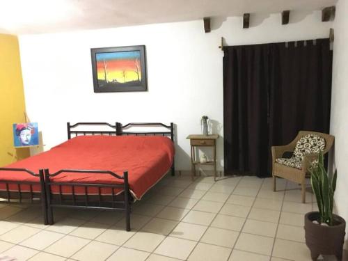 Postel nebo postele na pokoji v ubytování Casa Familiar Tepeji
