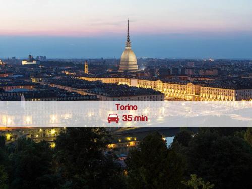 a view of the city of vienna with a bridge with the toto at Hotel Villa Glicini in Pinerolo