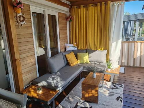 a living room with a couch and a table at Annika Mar in Selce