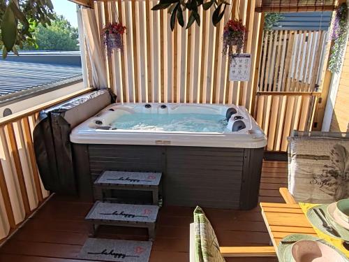 a jacuzzi tub sitting on top of a patio at Annika Mar in Selce