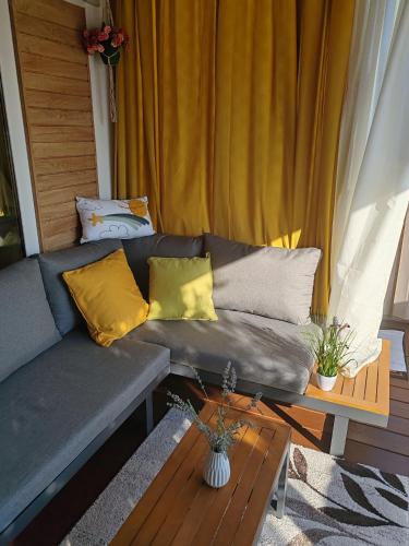 a living room with a couch and a coffee table at Annika Mar in Selce