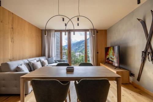 Posezení v ubytování Un diamante de montaña l A Pie De Pistas De Esquí - Gimnasio - Sauna - Piscina l 6Pax l by BonesVacances