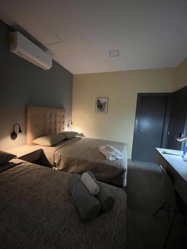 Postel nebo postele na pokoji v ubytování CoFE 0307