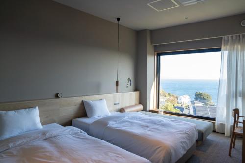 Katil atau katil-katil dalam bilik di HOTEL FARO manazuru - Vacation STAY 56470v