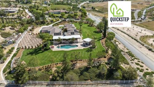 an aerial view of a house with a yard at Temecula Wine Country Villa in Temecula