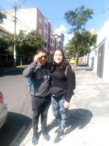 a man and a woman standing on a street at La Casa De La Nonna in Quito