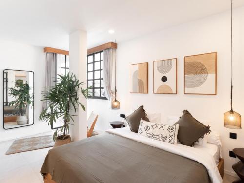 Ένα ή περισσότερα κρεβάτια σε δωμάτιο στο Tribeca Penthouse Canggu