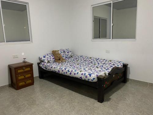 Giường trong phòng chung tại Villa Helena