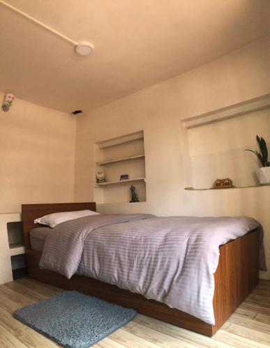 Postel nebo postele na pokoji v ubytování Samriddhi HomeStay