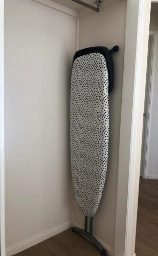 a black and white speaker in the corner of a room at Alroy Street 4/7 in Aitkenvale