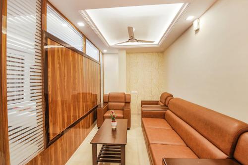 FabHotel SG5 Inn Suites-Yelahankaにあるシーティングエリア