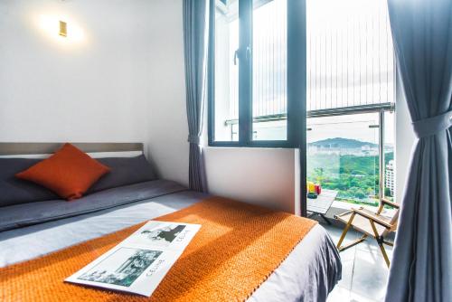Ένα ή περισσότερα κρεβάτια σε δωμάτιο στο WESU Apartment - Shenzhen Longhua Dalang Fashion Dalang Town Branch
