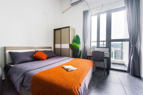 Ένα ή περισσότερα κρεβάτια σε δωμάτιο στο WESU Apartment - Shenzhen Longhua Dalang Fashion Dalang Town Branch