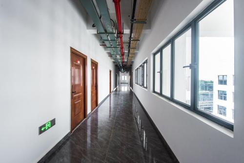 Φωτογραφία από το άλμπουμ του WESU Apartment - Shenzhen Longhua Dalang Fashion Dalang Town Branch στο Σενζέν