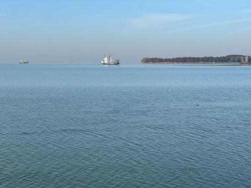 a large body of water with a boat in it at Le Meridien Suzhou, Suzhou Bay in Suzhou