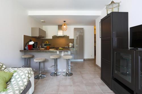 Η κουζίνα ή μικρή κουζίνα στο Appartement accès privé plage