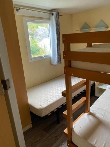 Postel nebo postele na pokoji v ubytování Calme proche de la mer