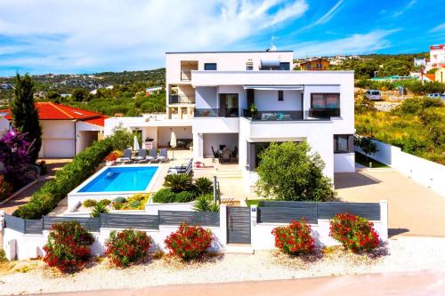 an image of a house with a swimming pool at Luxury Villa Dolce Vita, Sevid in Sevid