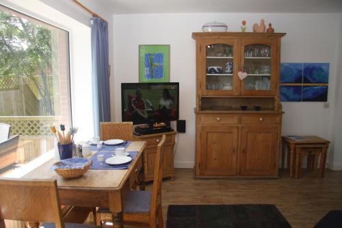 TV a/nebo společenská místnost v ubytování Haus Möösgraav