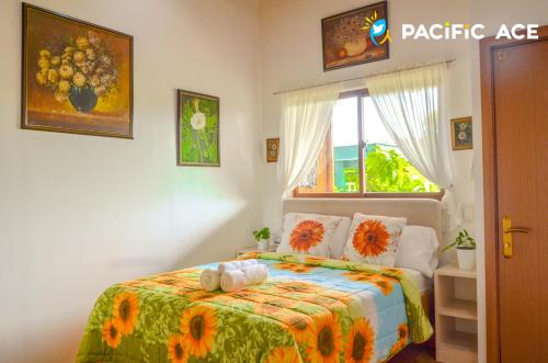 Postel nebo postele na pokoji v ubytování Sky Garden Homestay