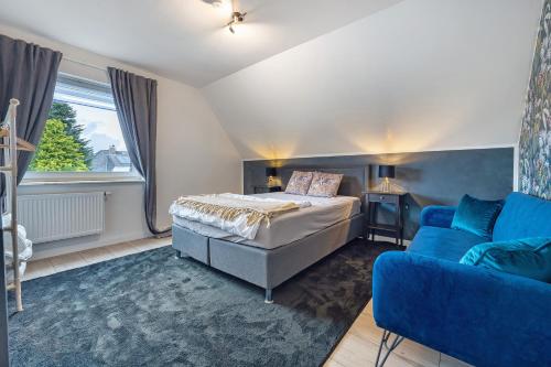 Ένα ή περισσότερα κρεβάτια σε δωμάτιο στο Penthouse Kokorey