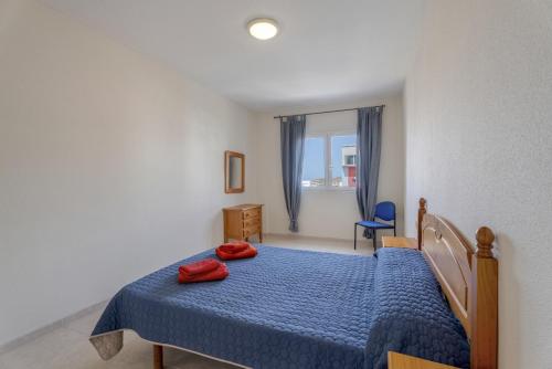 Ένα ή περισσότερα κρεβάτια σε δωμάτιο στο Isla 5