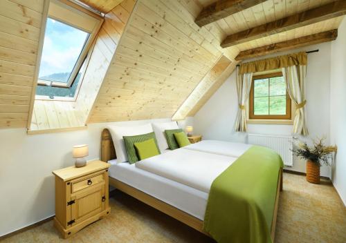 Postel nebo postele na pokoji v ubytování Apartmány a Štúdiá Lúčky, SKI-IN SKI-OUT ,Chopok Jasná, Demänovská dolina