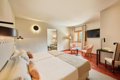 Ένα ή περισσότερα κρεβάτια σε δωμάτιο στο Virrey Finca Hotel