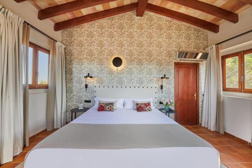 Ένα ή περισσότερα κρεβάτια σε δωμάτιο στο Virrey Finca Hotel