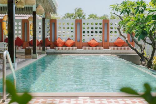 a pool at the resort at A-ONE Pattaya Beach Resort in Pattaya