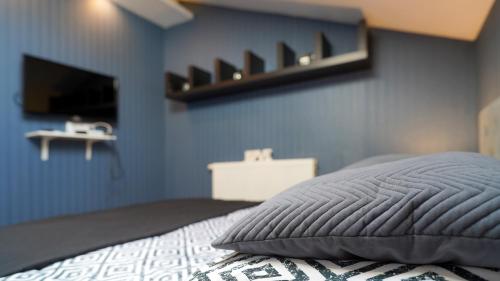 Ένα ή περισσότερα κρεβάτια σε δωμάτιο στο Apartments ALKANTARA