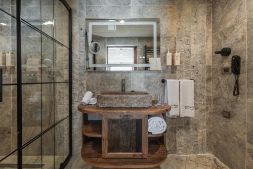 a bathroom with a sink and a shower at Barceló Cappadocia in Nevsehir