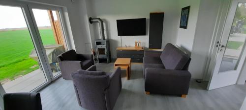 Ruang duduk di Ferienhaus Nordlicht
