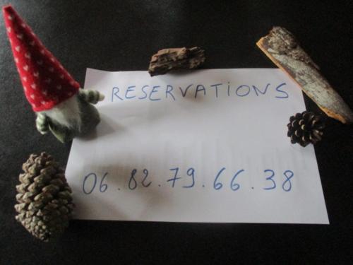 a santa hat and a piece of paper with at T3 ecolo en campagne in Le Roc-Saint-André