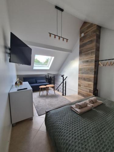 Photo de la galerie de l'établissement Logement indépendant dans une zone pavillonnaire au calme, situé entre Disneyland et Paris, à Ozoir-la-Ferrière