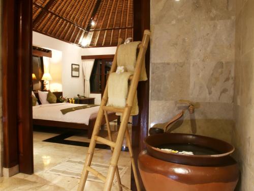 Ένα ή περισσότερα κρεβάτια σε δωμάτιο στο Toya Retreat Villa