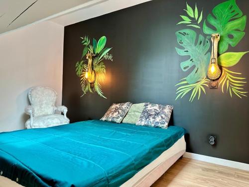 Ένα ή περισσότερα κρεβάτια σε δωμάτιο στο Villa Merlibeach - 3 logements 4 personnes