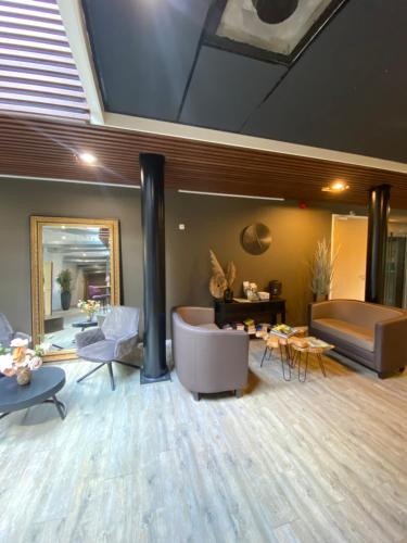 Χώρος καθιστικού στο Boshotel Overberg