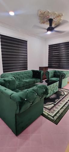 Χώρος καθιστικού στο Homestay Ayah Chik