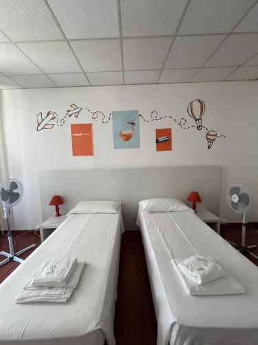 Una cama o camas en una habitación de Smart Accomodation