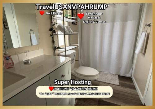 a bathroom with a shower curtain and a toilet at TravelUSANVPahrump in Pahrump