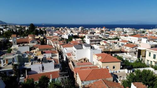 an aerial view of a city with buildings at DATA Maisonettes and more in Chios